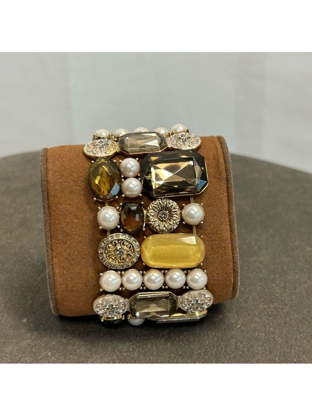 Stretchy cuff bracelet with large multi-colored stones and faux pearls